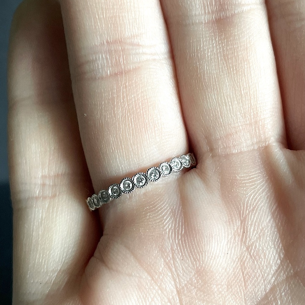 Ancora Designs. 14K gold and diamonds all around. Purchased for around $2000.